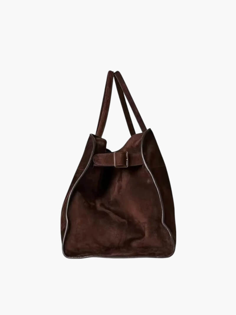 Elegant damväska i vegetabiliskt läder med rymlig design