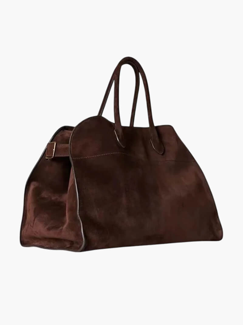 Elegant damväska i vegetabiliskt läder med rymlig design