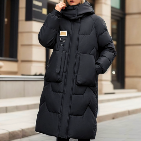 Lång vadderad kappa i oversized-modell för damer