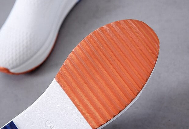 Stickade slip-on-sneakers med andningsförmåga för damer